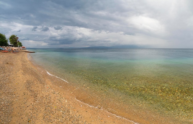 Beach on the Aegean Sea in Greece before rain and thunderstorm