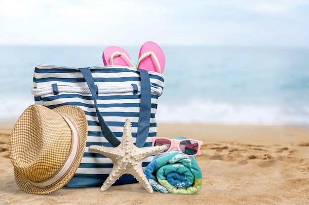 Beach bag with beach accessories, summer vacation concept