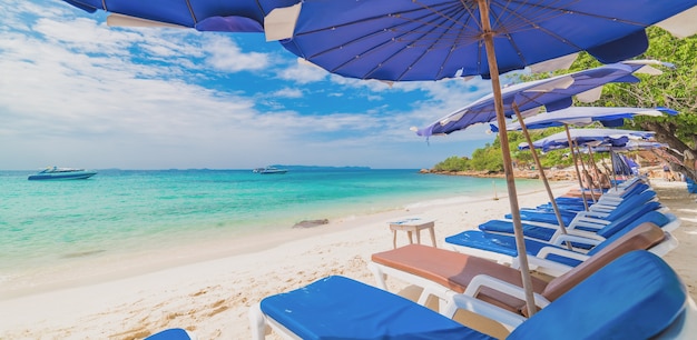 Beach chair and umbrella on the beach