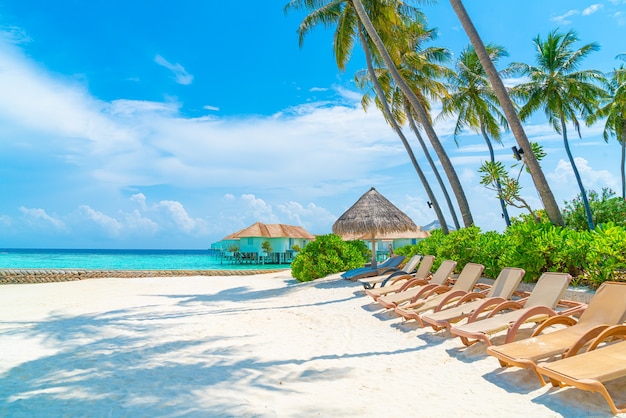 beach chair with tropical Maldives island  beach and sea - holiday vacation concep