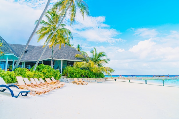 beach chair with tropical Maldives island  beach and sea