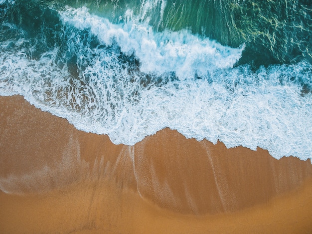 Beach full of rocks and waves in Spain