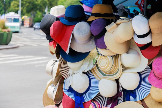 Beach hats selling on the city street