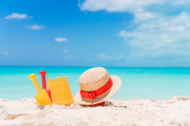 Beach kid's toys on white sand beach