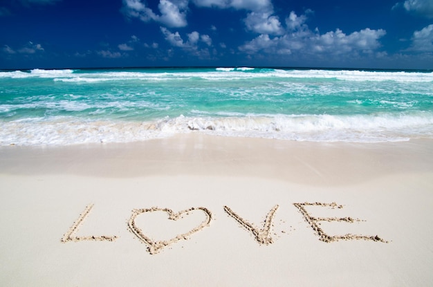 Beach and love in sand