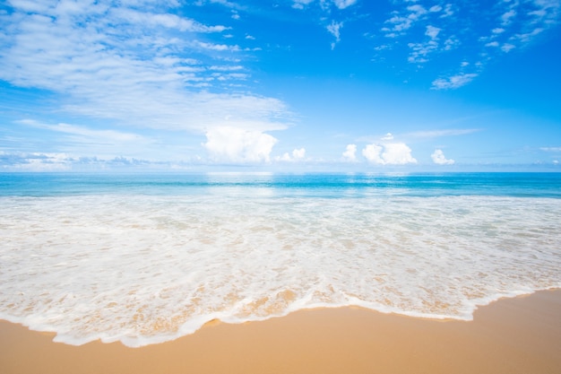 beach sand sea blue sky background