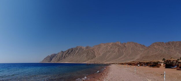 Beach sea with mountains panorama