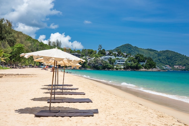 Beach umbrella on beach with blue sky, phuket thailand