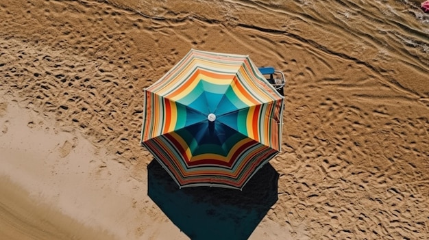 Beach umbrella with chairs inflatable ring on beach sand summer vacation concept top view