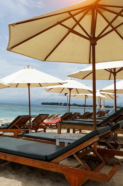 Beach umbrellas with sun beds on the beach