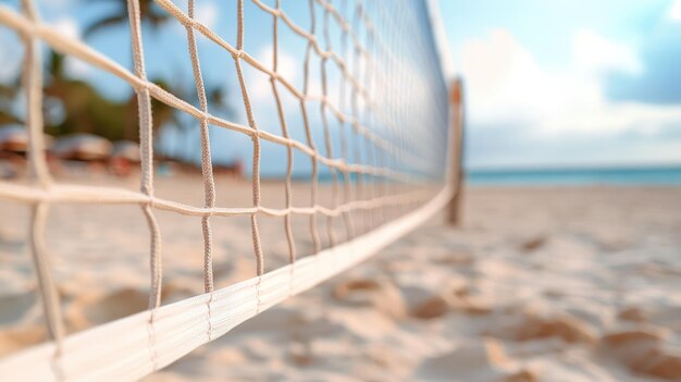 Photo beach volleyball net on sandy shore closeup perspective with ocean background summer sports and r