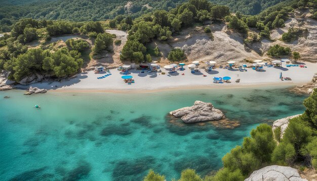 a beach with a few small houses on the shore