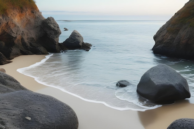 a beach with rocks and water with a beach in the background