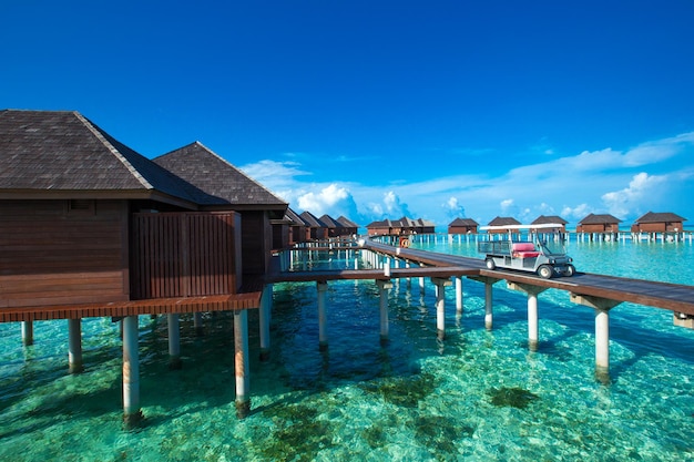 Beach with water bungalows at Maldives