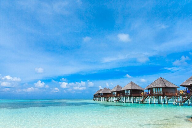 Beach with water bungalows at Maldives