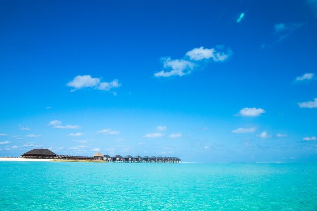 Beach with water bungalows at Maldives