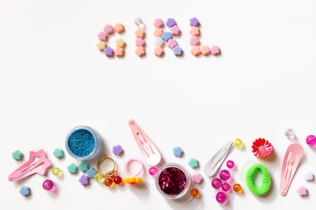 Beads inscription girl and accessories set on white