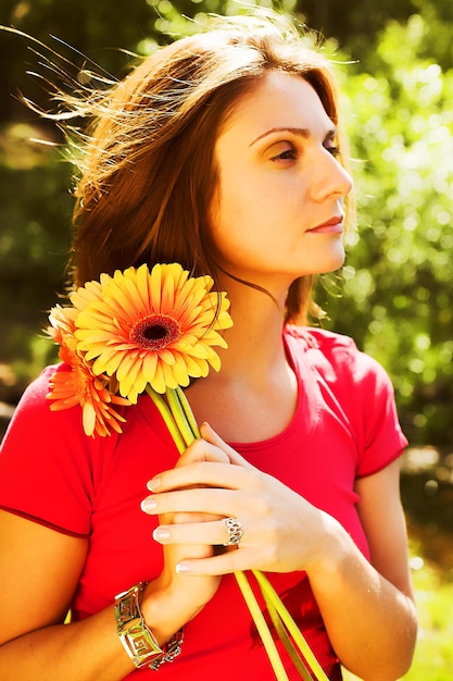 Beaituful woman with gerber