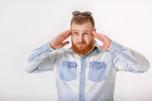 Beard man in sunglasses and denim shirt