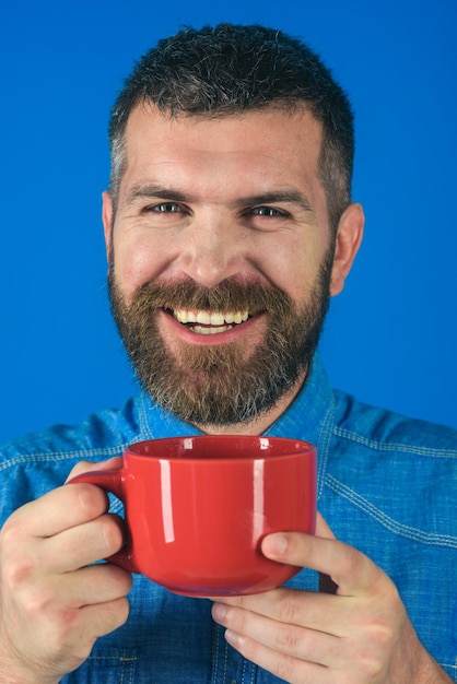 Bearded hipster with milk cup