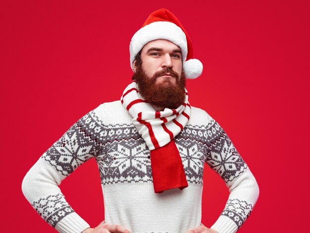 bearded male in Christmas hat