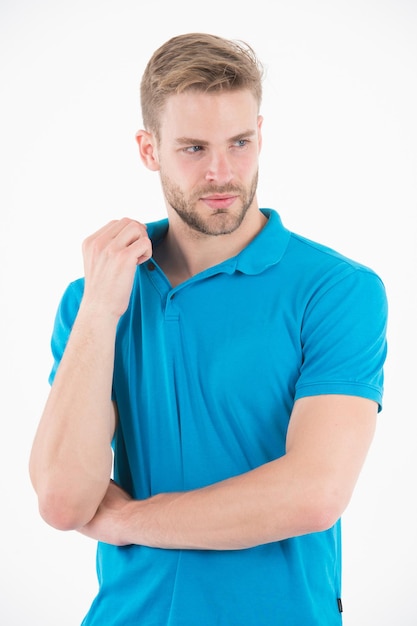 Bearded man in blue tshirt. Man with beard on unshaven face skin. Fashion model with stylish hair isolated on white background. Skincare and barber salon. Style or trend and hairstyle concept.