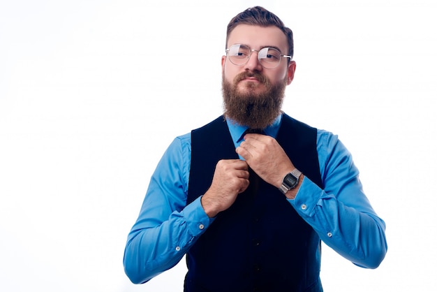 bearded man in a business suit on a white background