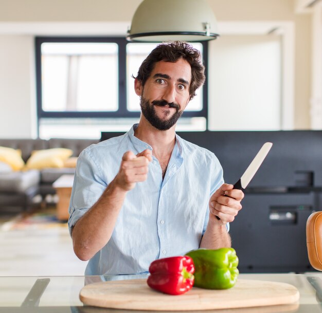 Bearded man pointing