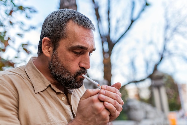 Bearded Man Smoking on the Street