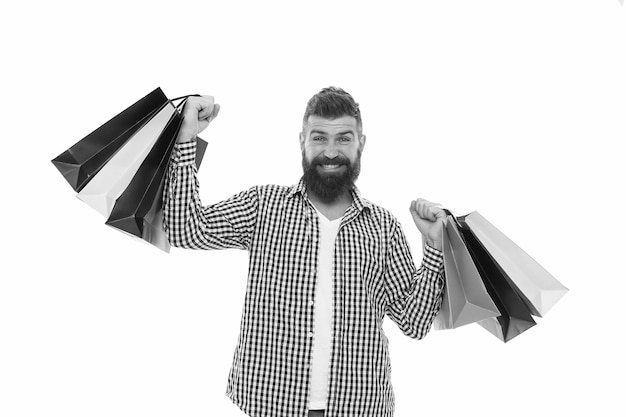 Bearded man with shopping bags Mature happy hipster with beard Shopping sale Male barber care brutal caucasian hipster with moustache Black Friday Cyber Monday Heavy bags