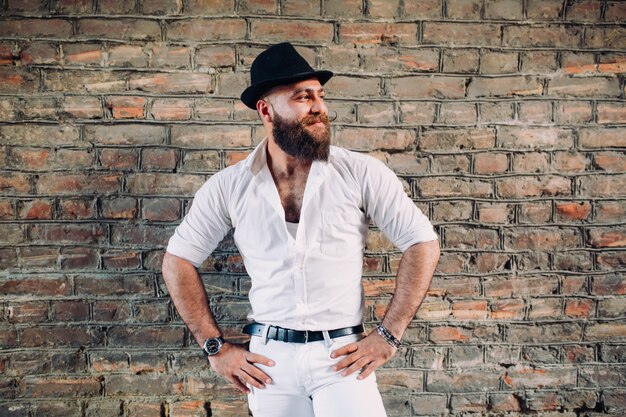 beared man wearing white