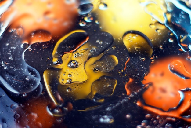 Beautiful abstract space background, mixed drops and water and oil