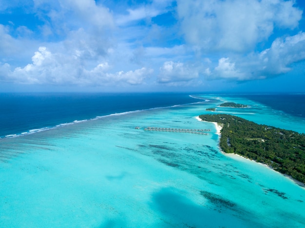 Beautiful aerial view of Maldives and tropical beach . Travel and vacation concept