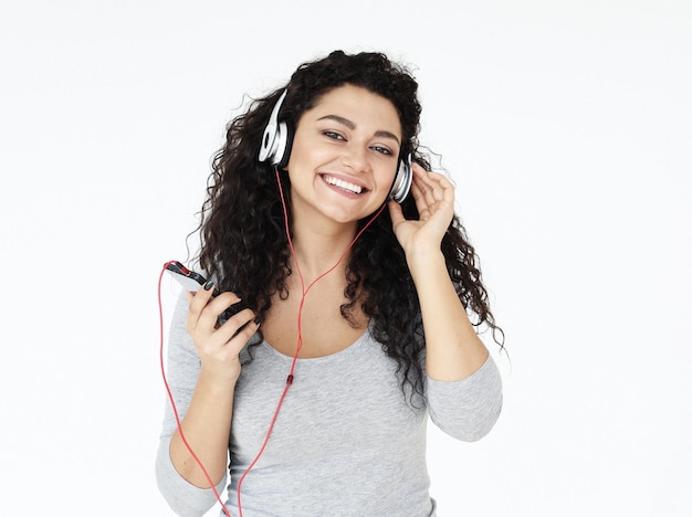 Beautiful African American female listen to music