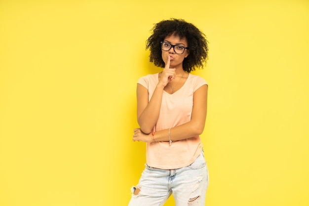 Beautiful african american female model posing in studio.