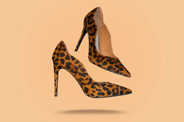 Beautiful animal print high heel footwear fashion female style isolated on background