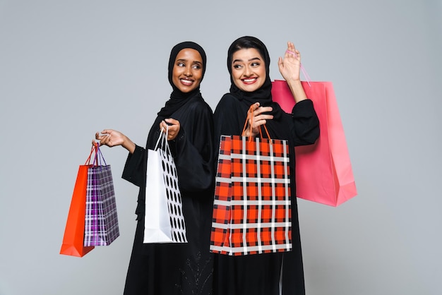 Beautiful arab middleeastern women with traditional abaya in studio