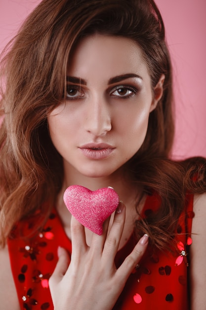 Beautiful arabic or latin american woman in red dress