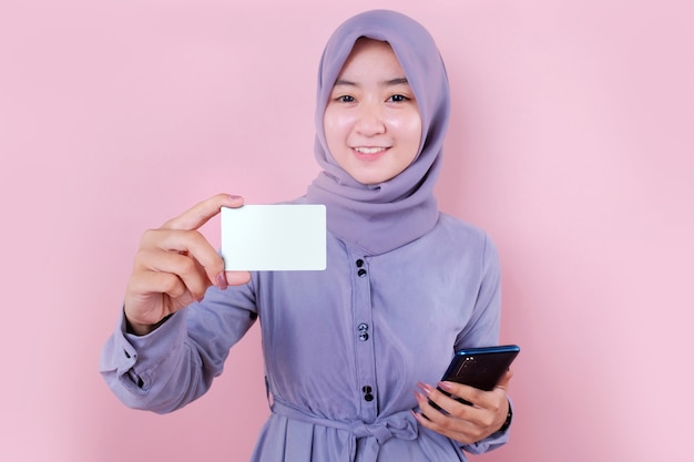 Beautiful Asian Muslim woman in a blue dress