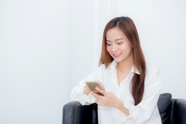 Beautiful asian woman smiling sitting relax on the chair