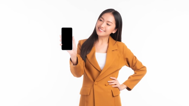 Beautiful Asian young woman Excited surprised girl showing smart phone with blank screen black screen for Mobile App Advertising isolated on white background smart phone display Mock Up Image