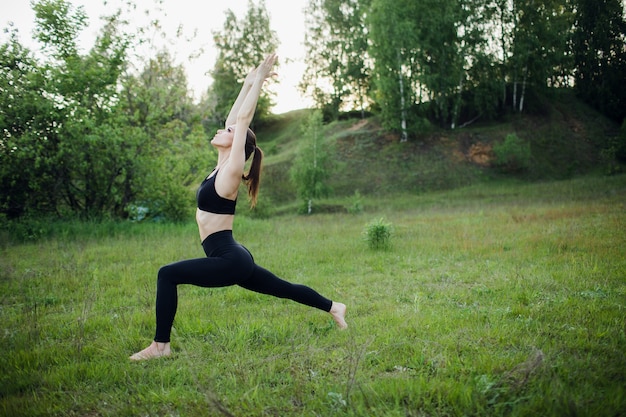 Beautiful athletic woman in sportswear training