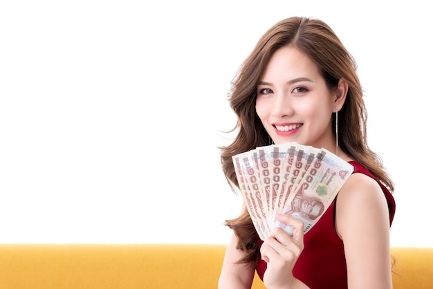 Beautiful attractive asian woman smile with confident hand show money bill business shopping ideas concept