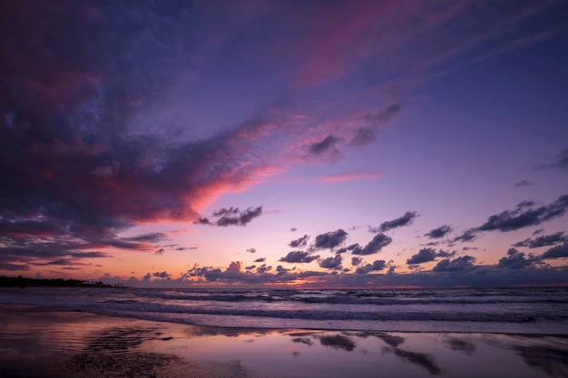 Beautiful beach in evening with reflection. The time after sunset