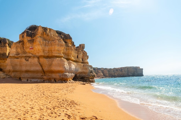 Beautiful beach in summer at sunset at Praia da Coelha Algarve Albufeira Portugal