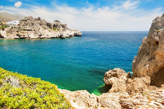 Beautiful beach with clear turquoise water and rocks. Crete island, Greece.