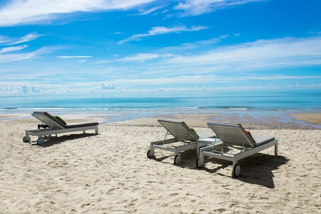 Beautiful beach with deckchairs