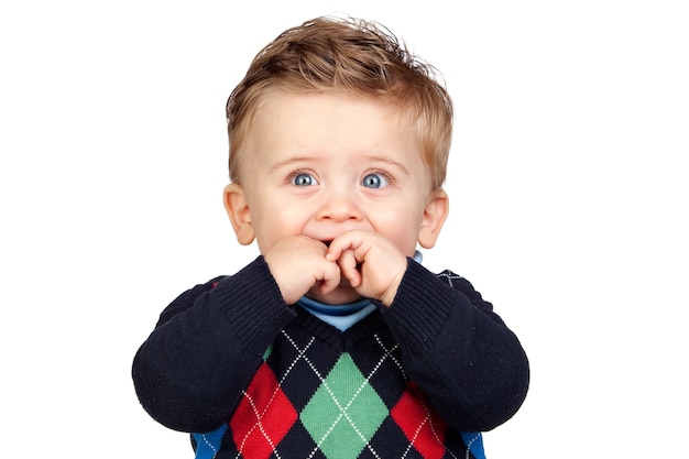 Beautiful blond baby with blue eyes isolated 