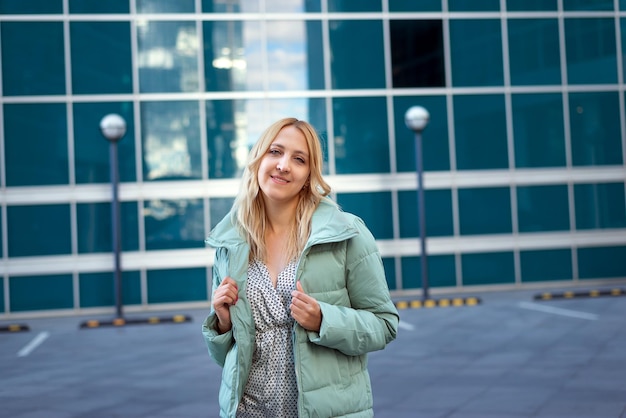 Beautiful blonde posing in the city