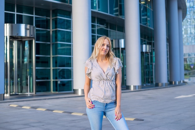 Beautiful blonde posing in the city